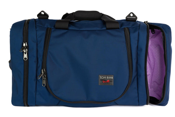 A Deep Blue (navy blue) Ballistic Aeronaut 45 with a Wisteria (pale purple with white grid) 200 Halcyon interior.